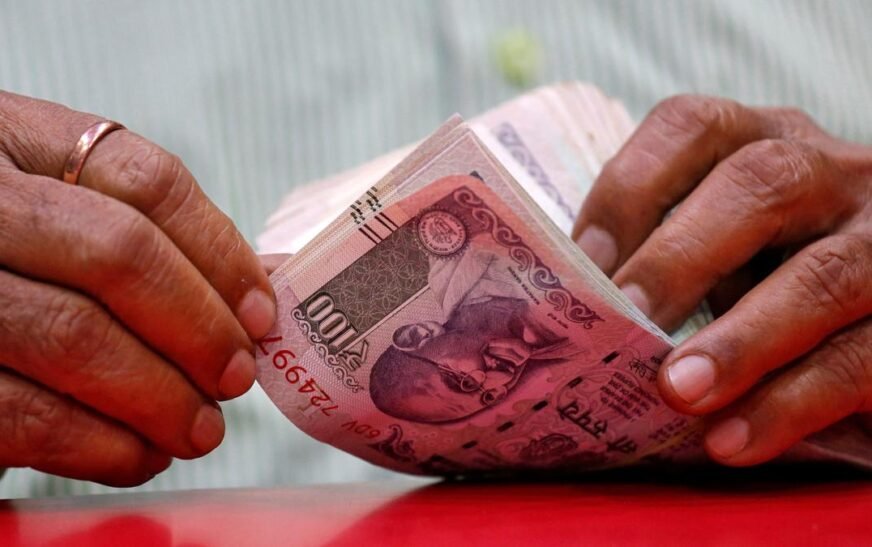 Rupee turns flat at 84.42 against U.S. dollar in early trade